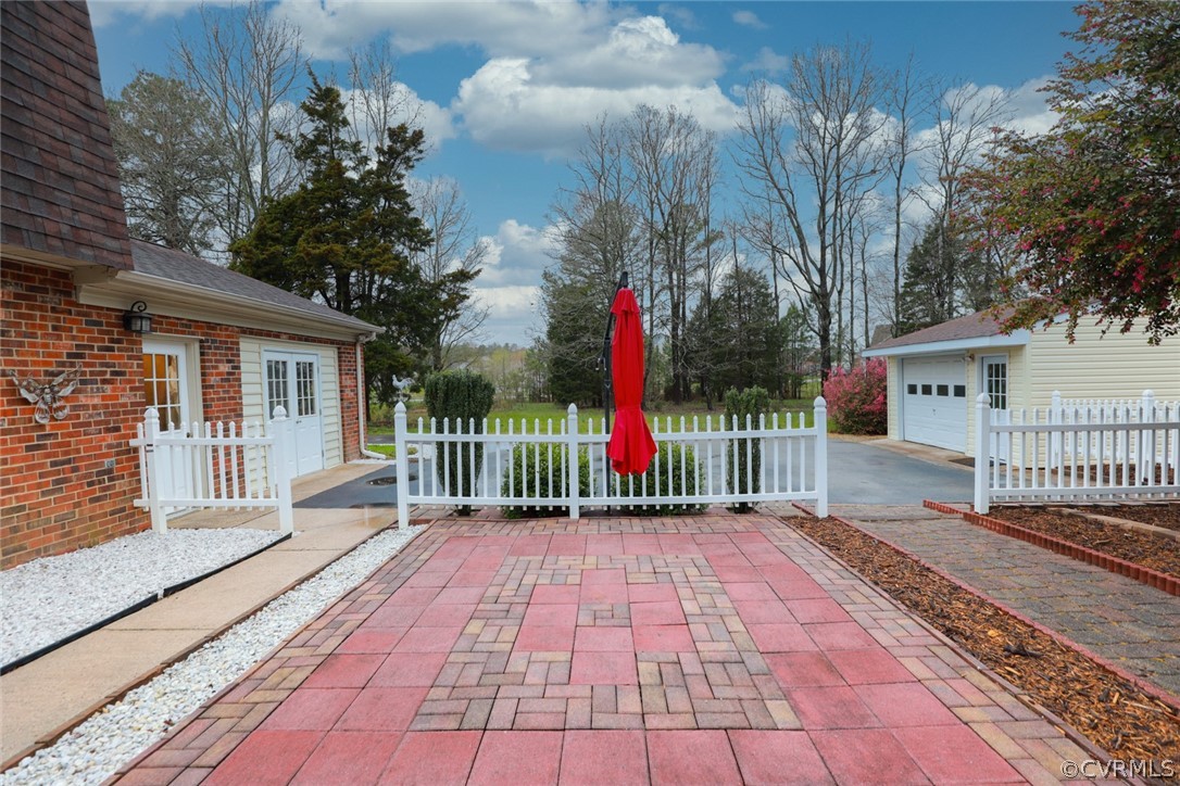 2106 Mt Blanco Road Chester, VA 23836 - Photo 40 of 50 a front view of a house with a garden and trees