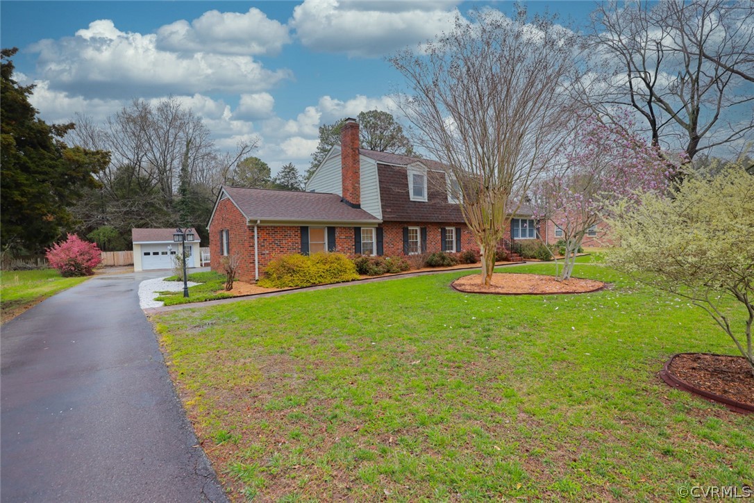 2106 Mt Blanco Road Chester, VA 23836 - Photo 4 of 50 a front view of a house with garden