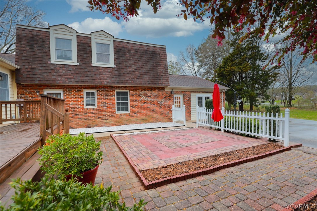 2106 Mt Blanco Road Chester, VA 23836 - Photo 42 of 50 a front view of a house with a garden