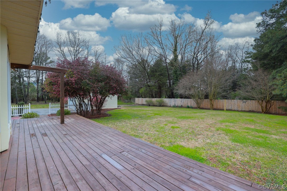 2106 Mt Blanco Road Chester, VA 23836 - Photo 44 of 50 a view of a yard with wooden deck