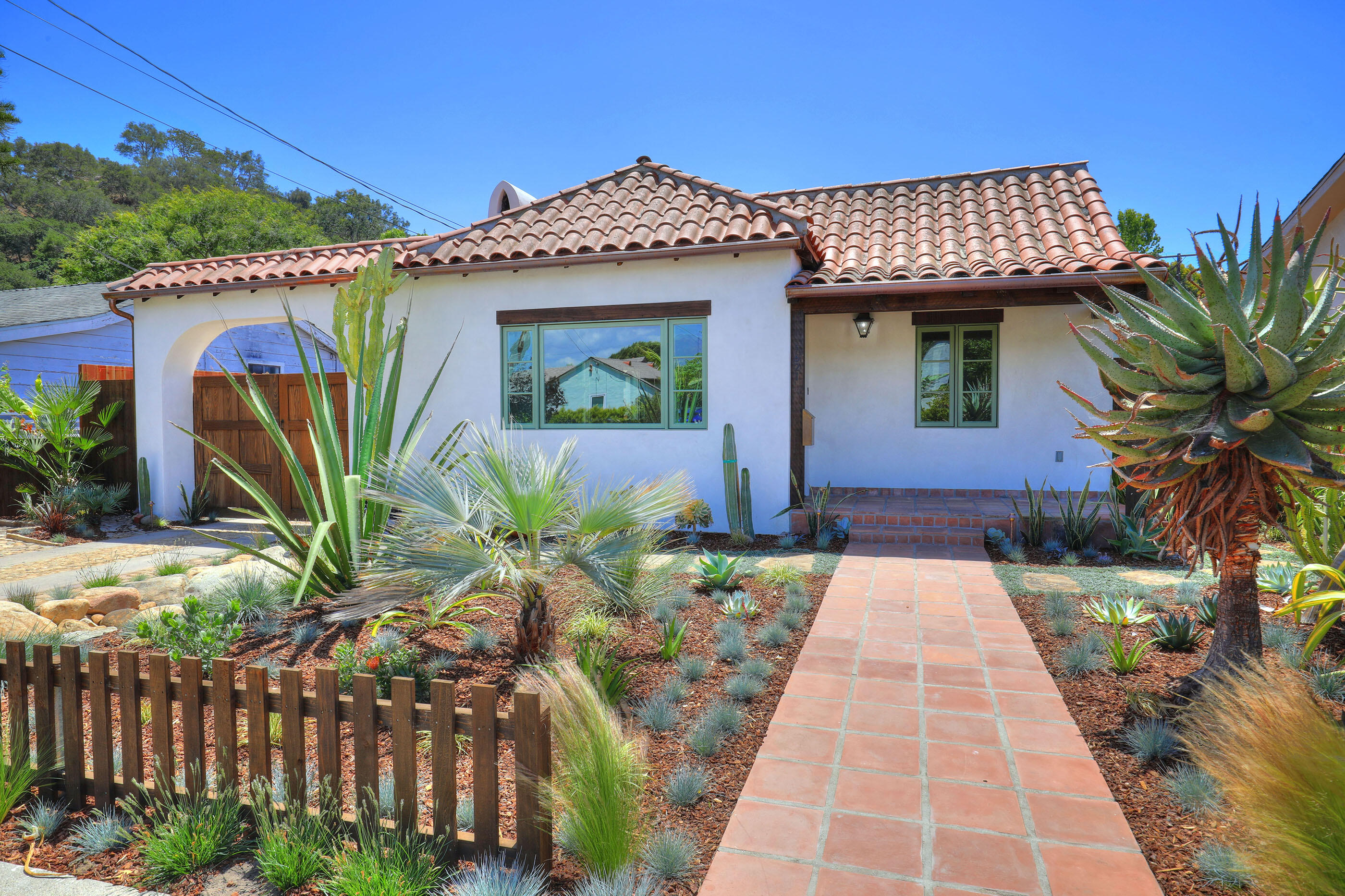 1621 Clearview Road Santa Barbara, CA 93101 - Photo 1 of 20 a front view of a house with garden
