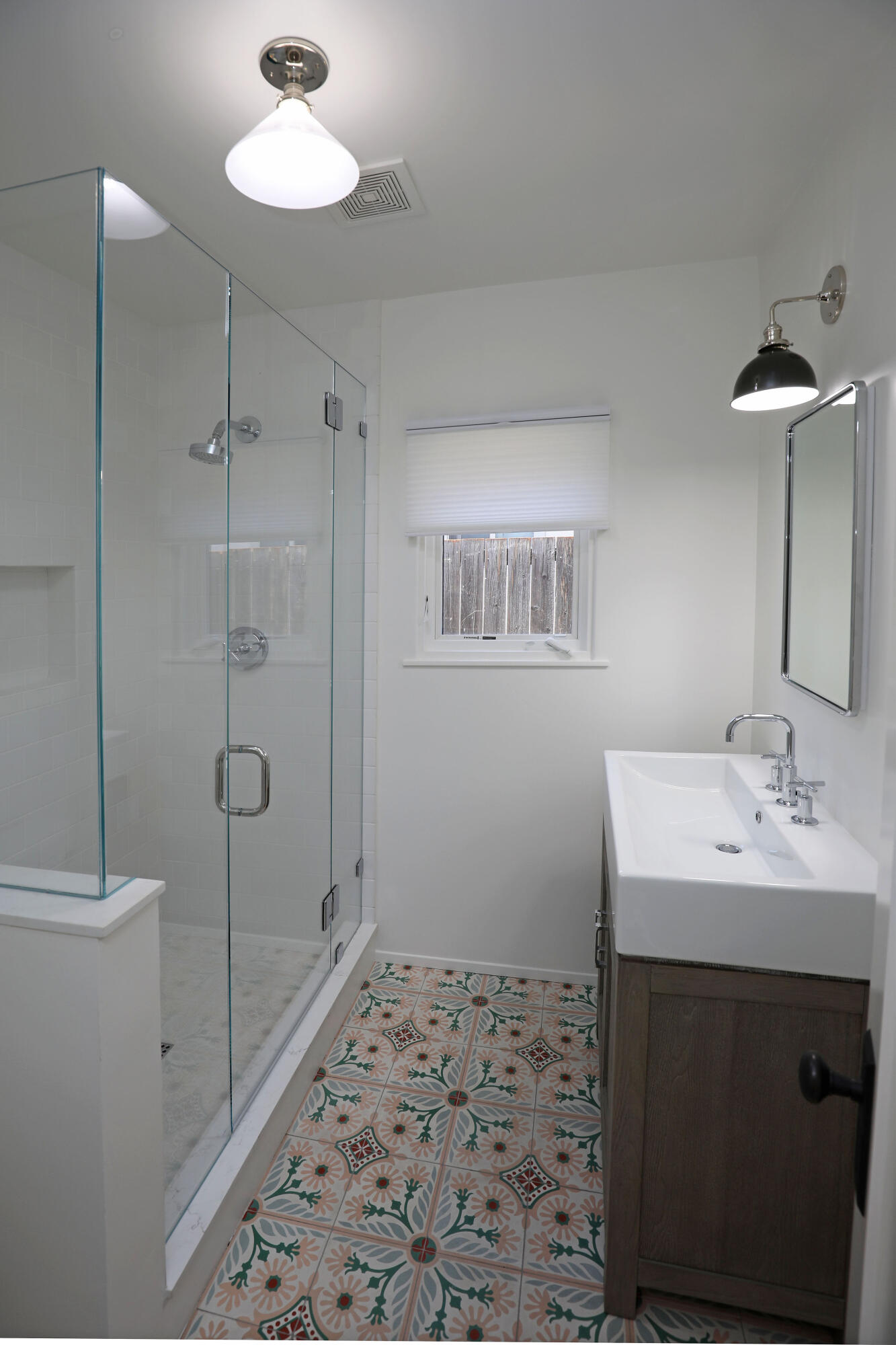 1621 Clearview Road Santa Barbara, CA 93101 - Photo 9 of 20 a bathroom with a sink a light fixture and a toilet