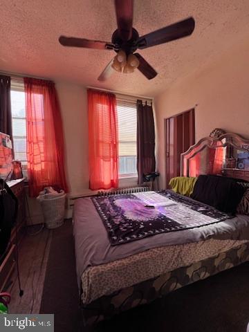 1601 St. Paul Street Philadelphia, PA 19140 - Photo 11 of 17 a bed sitting in a bedroom next to a window