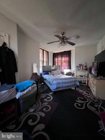 1601 St. Paul Street Philadelphia, PA 19140 - Photo 13 of 17 a living room with furniture a flat screen tv and a window