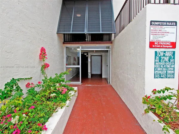a view of a yard with a palm tree