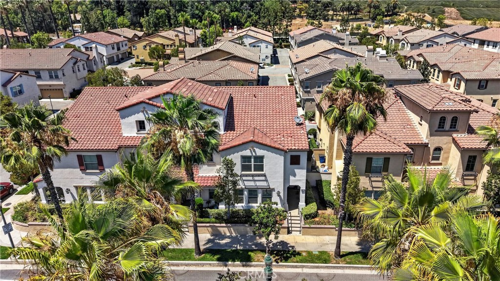849 The Promenade, Unit D Azusa, CA 91702 - Photo 34 of 37 an aerial view of multiple houses