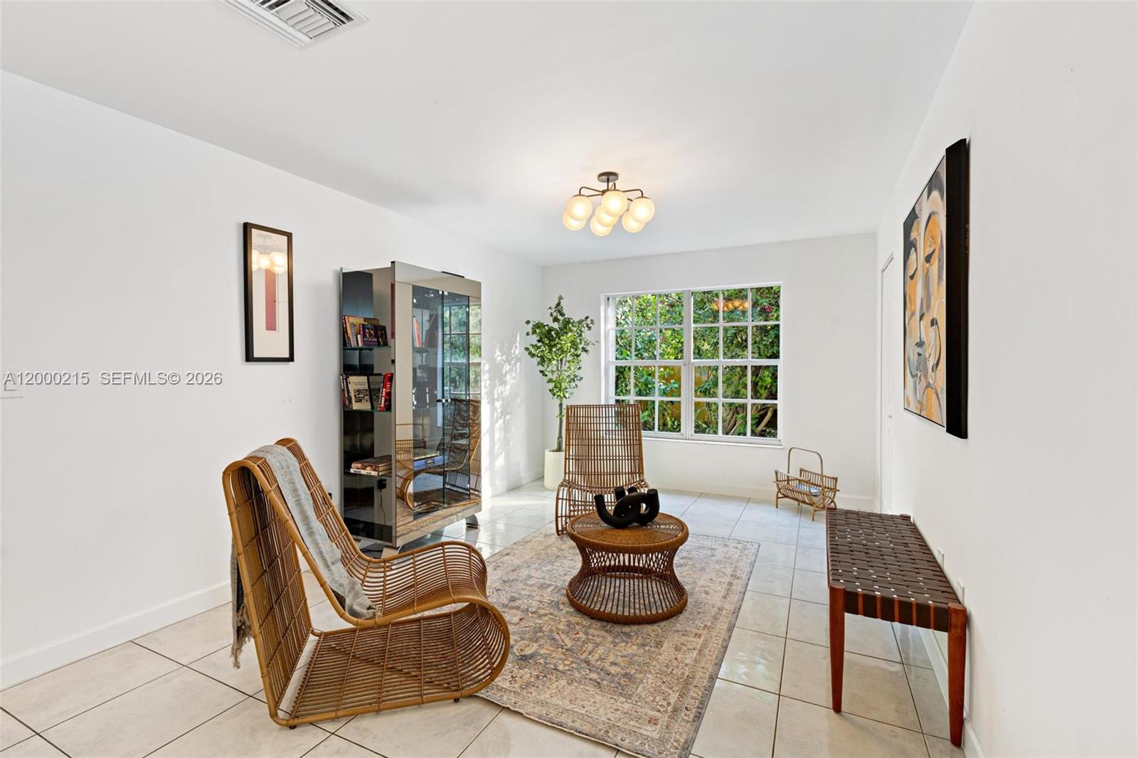 14850 Old Cutler Road Palmetto Bay, FL 33158 - Photo 12 of 19 a living room with furniture and a window