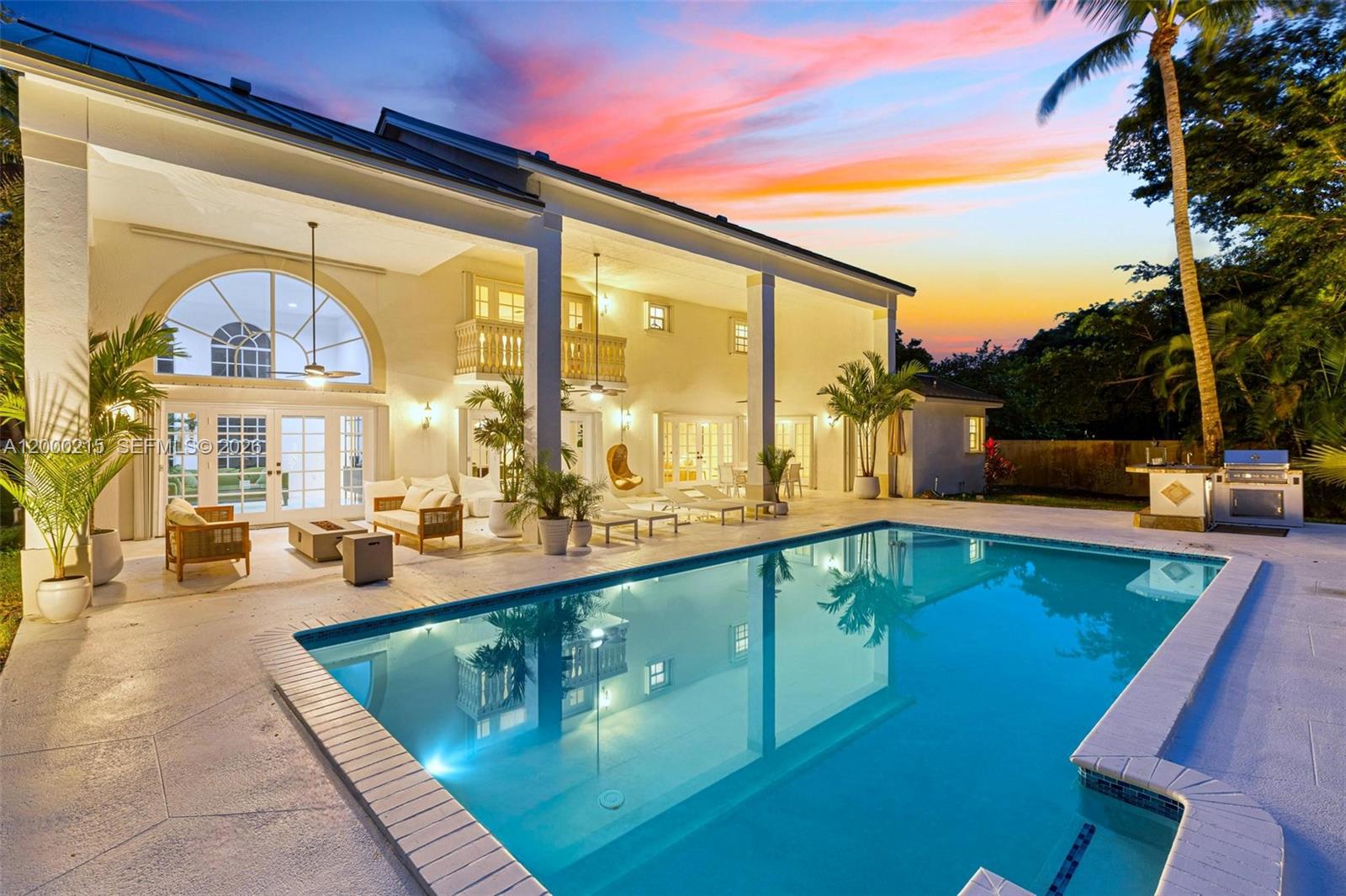 14850 Old Cutler Road Palmetto Bay, FL 33158 - Photo 7 of 19 a view of swimming pool with outdoor seating