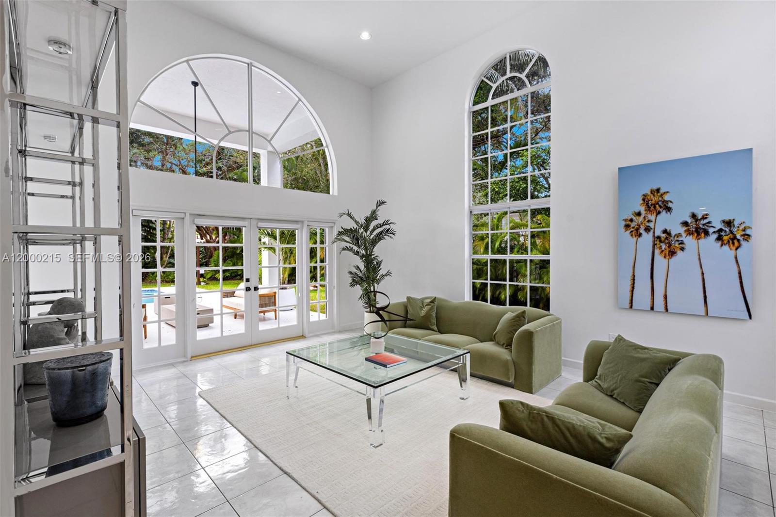 14850 Old Cutler Road Palmetto Bay, FL 33158 - Photo 9 of 19 a living room with furniture and a large window