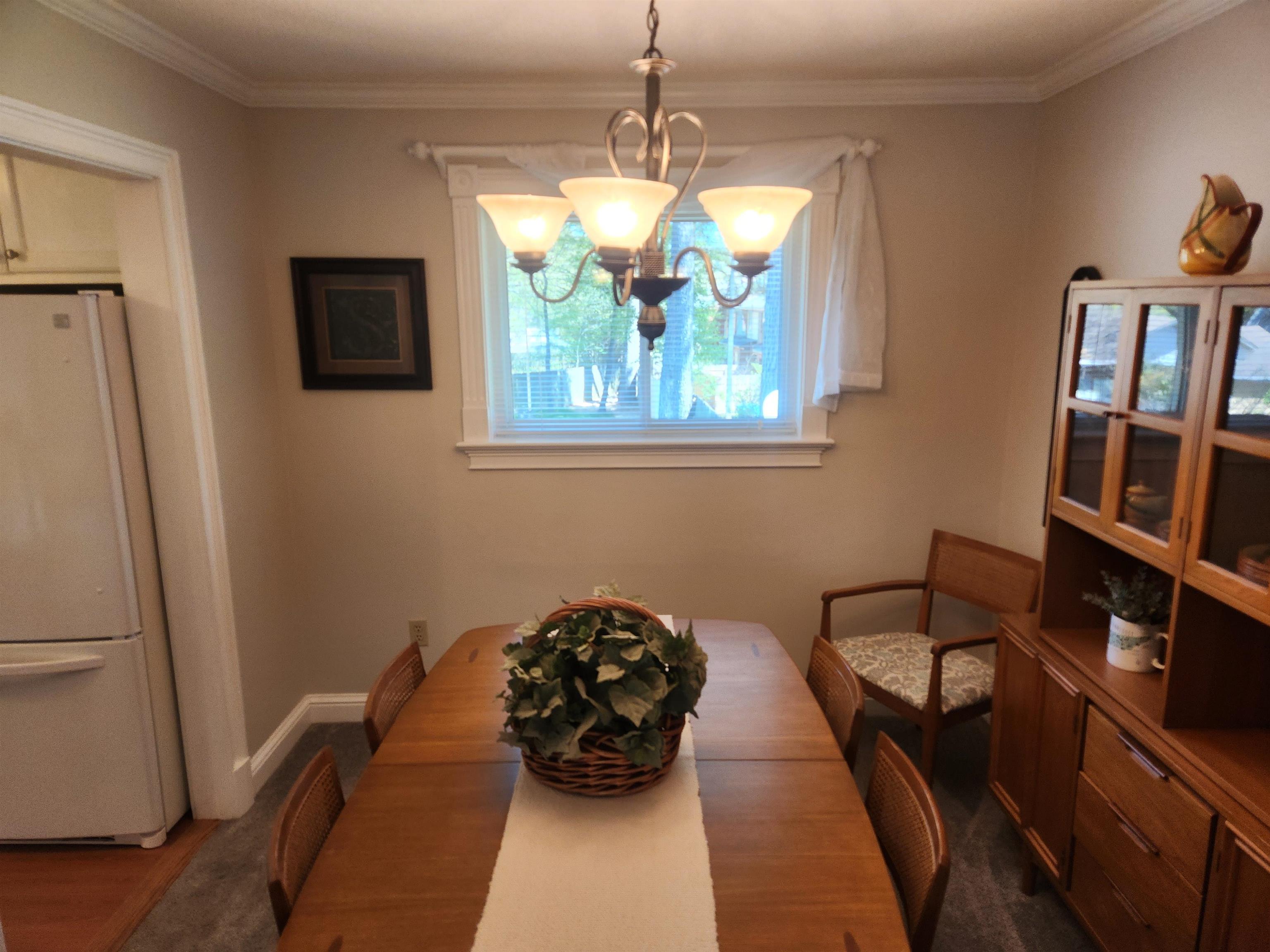 1424 Mullins Station Road Memphis, TN 38134 - Photo 12 of 40 a view of a livingroom with furniture and a window