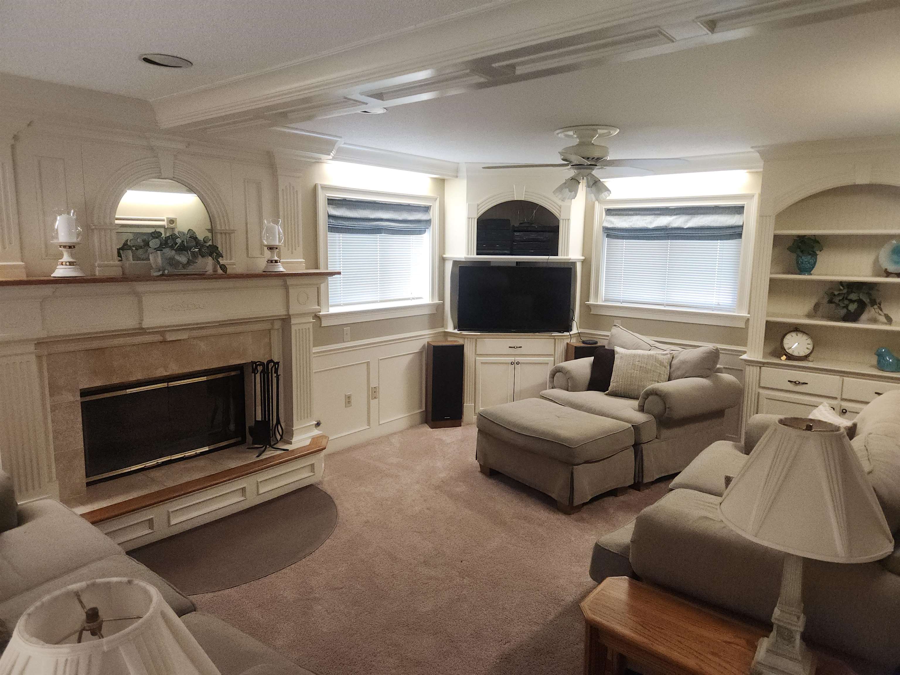 1424 Mullins Station Road Memphis, TN 38134 - Photo 24 of 40 a living room with furniture and a fireplace