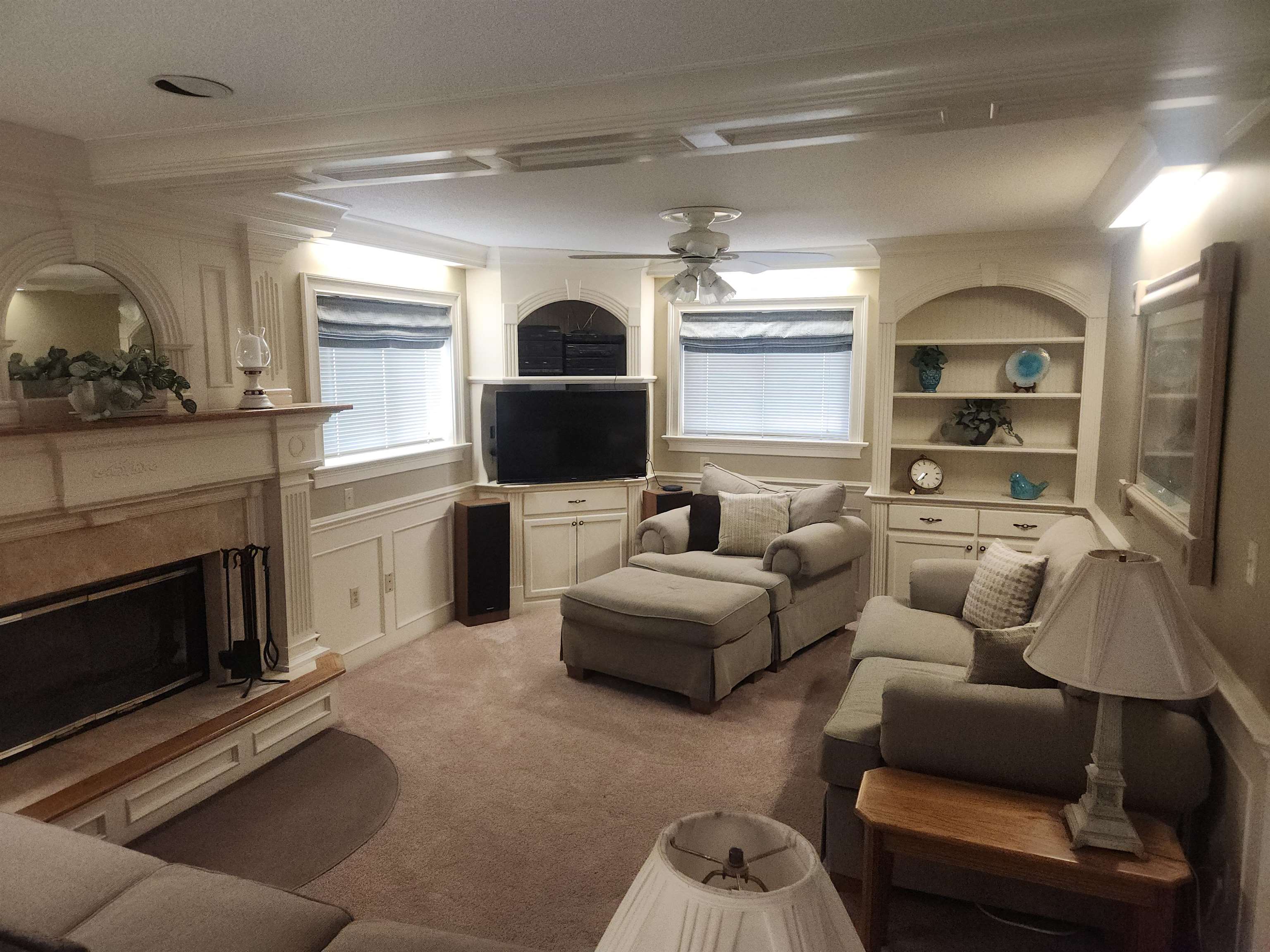 1424 Mullins Station Road Memphis, TN 38134 - Photo 25 of 40 a living room with furniture and a fireplace