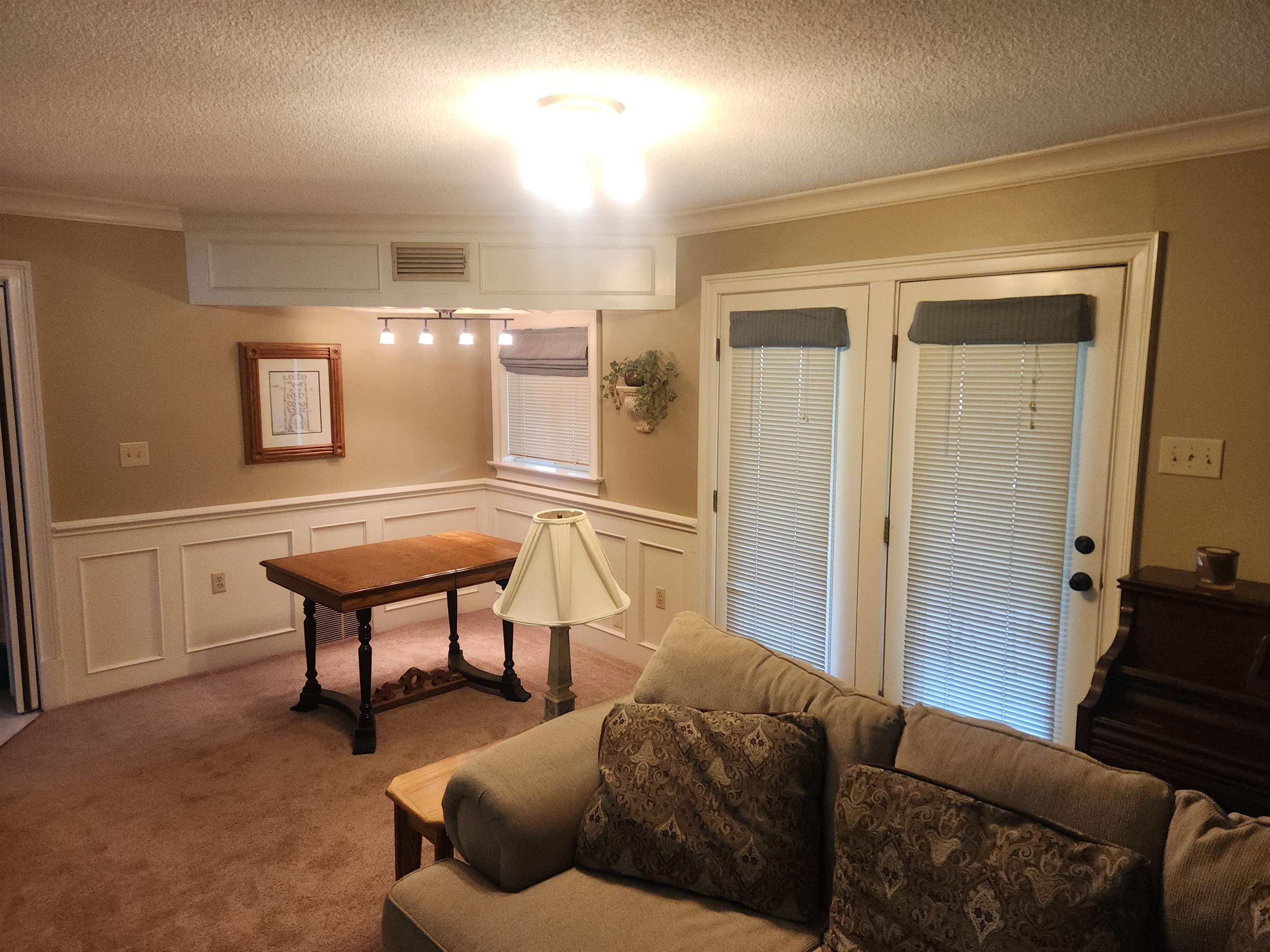 1424 Mullins Station Road Memphis, TN 38134 - Photo 26 of 40 a living room with furniture and a wooden floor