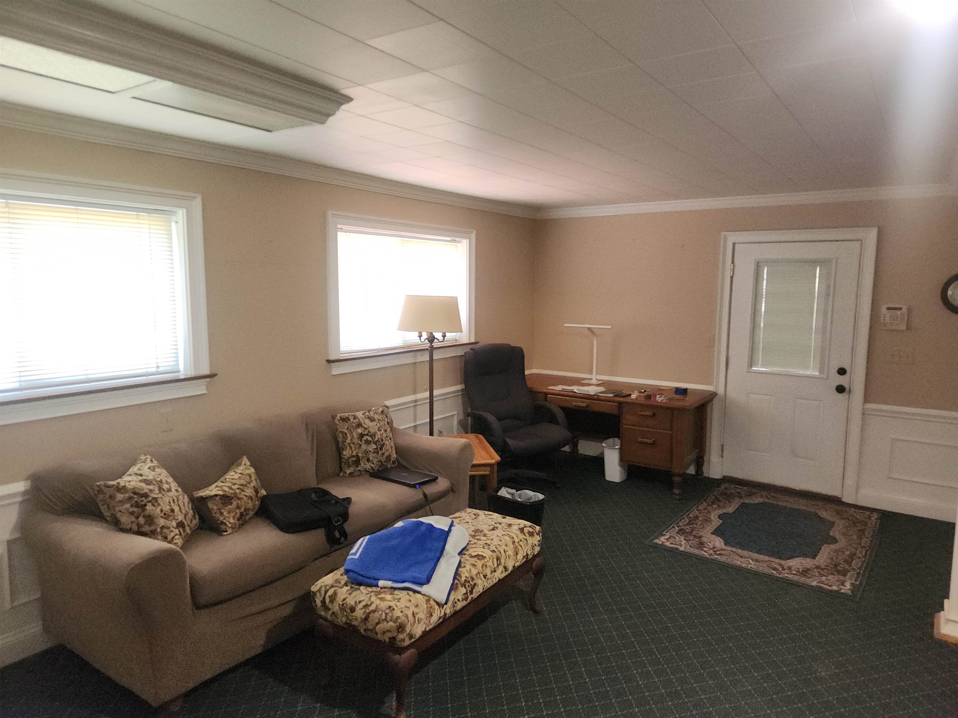1424 Mullins Station Road Memphis, TN 38134 - Photo 27 of 40 a living room with furniture couches and a window