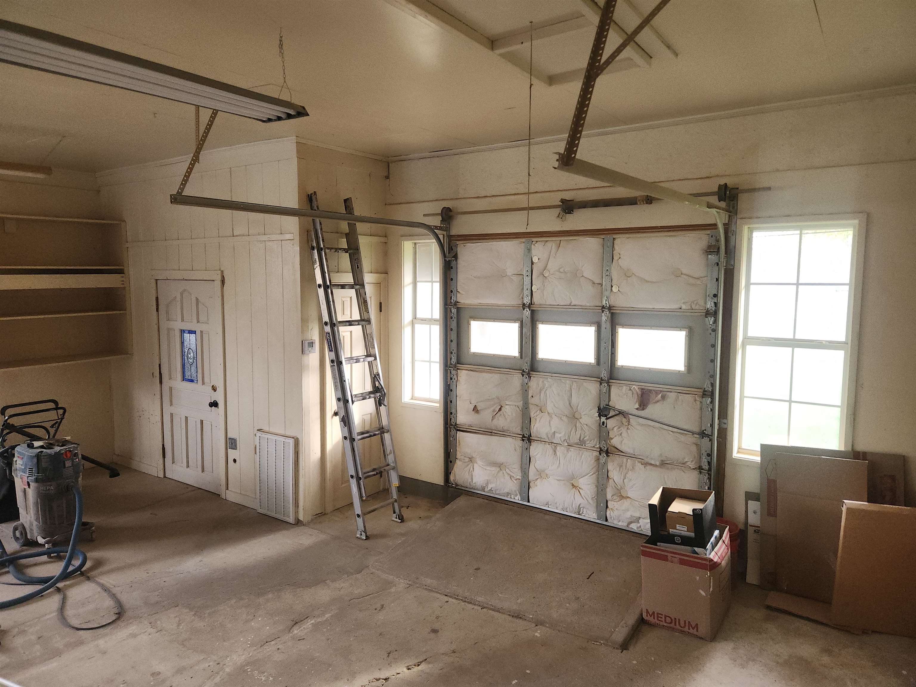 1424 Mullins Station Road Memphis, TN 38134 - Photo 33 of 40 a view of a garage room with windows