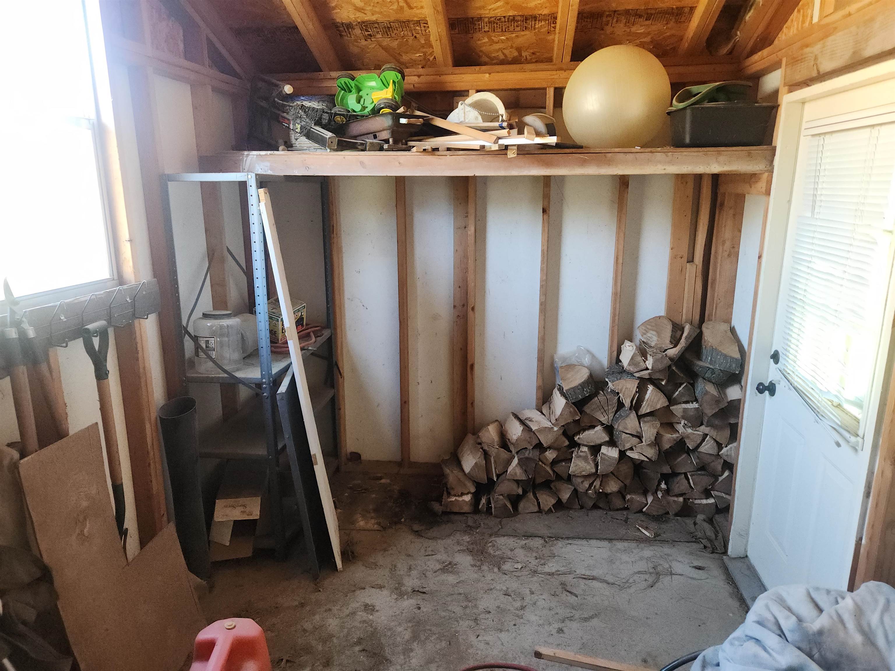 1424 Mullins Station Road Memphis, TN 38134 - Photo 34 of 40 a view of a closet with wooden door