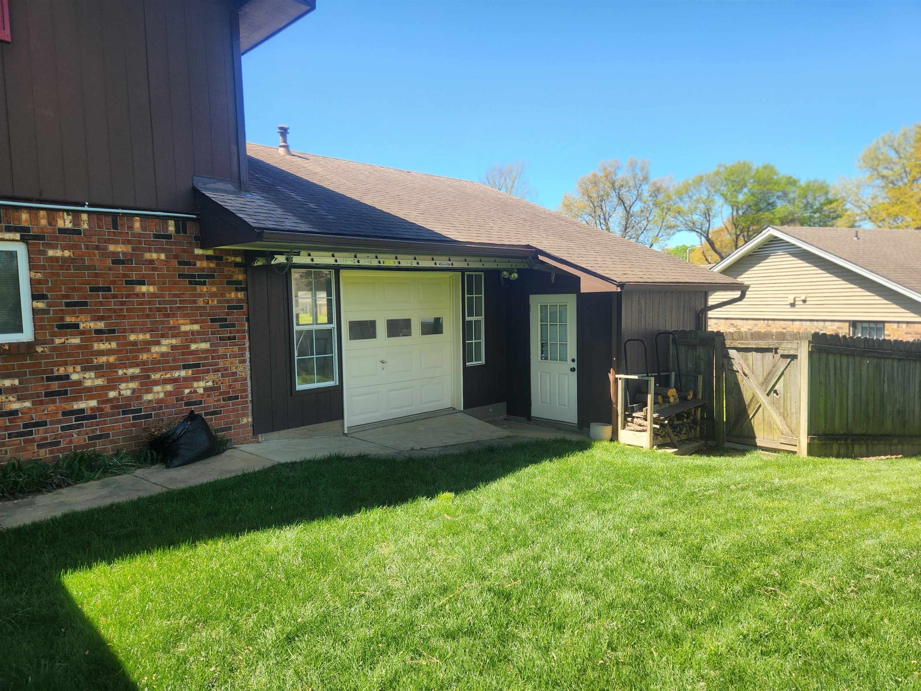 1424 Mullins Station Road Memphis, TN 38134 - Photo 36 of 40 a view of a house with a yard