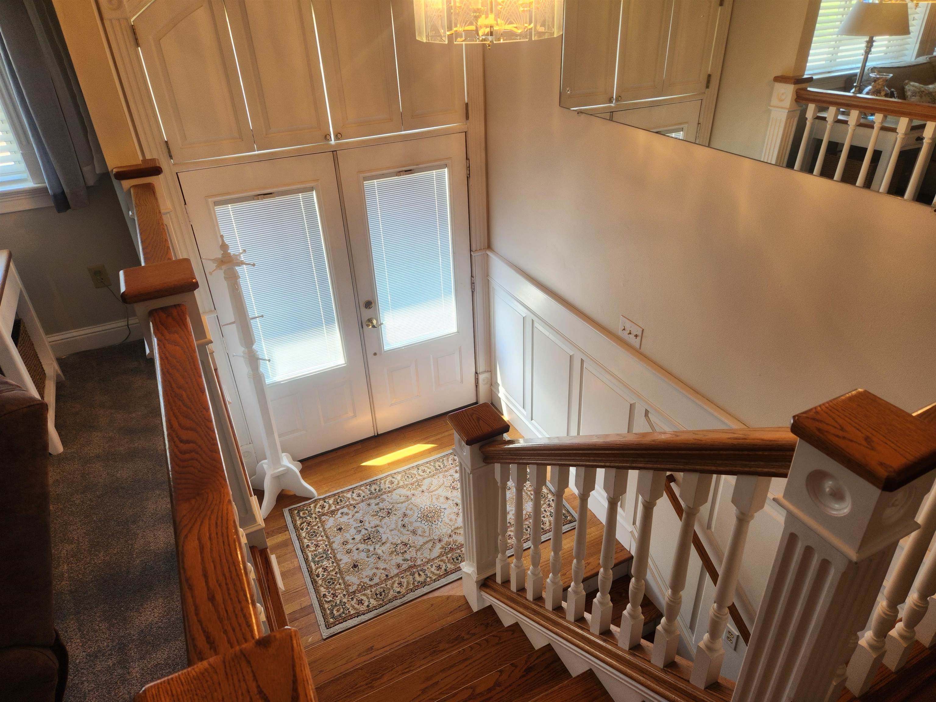 1424 Mullins Station Road Memphis, TN 38134 - Photo 6 of 40 a view of staircase with railing and white walls