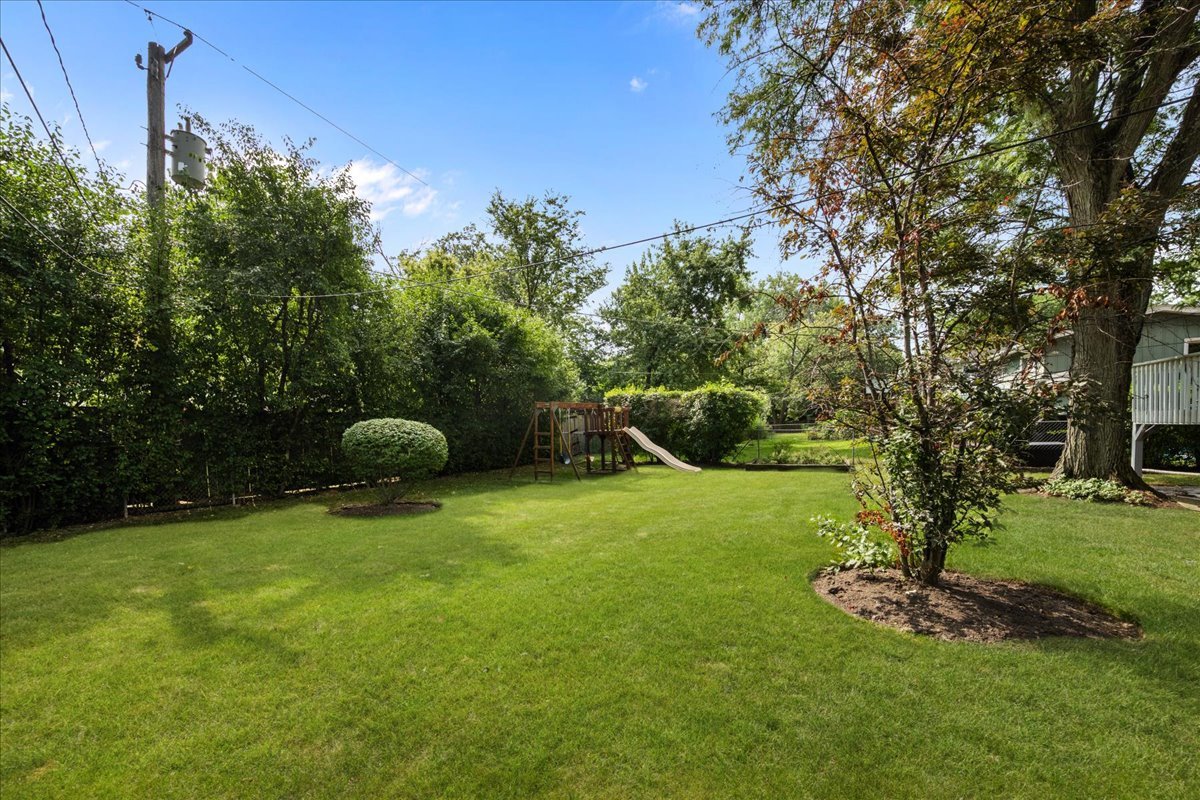 1115 Kenton Road Deerfield, IL 60015 - Photo 23 of 30 a backyard of a house with lots of green space