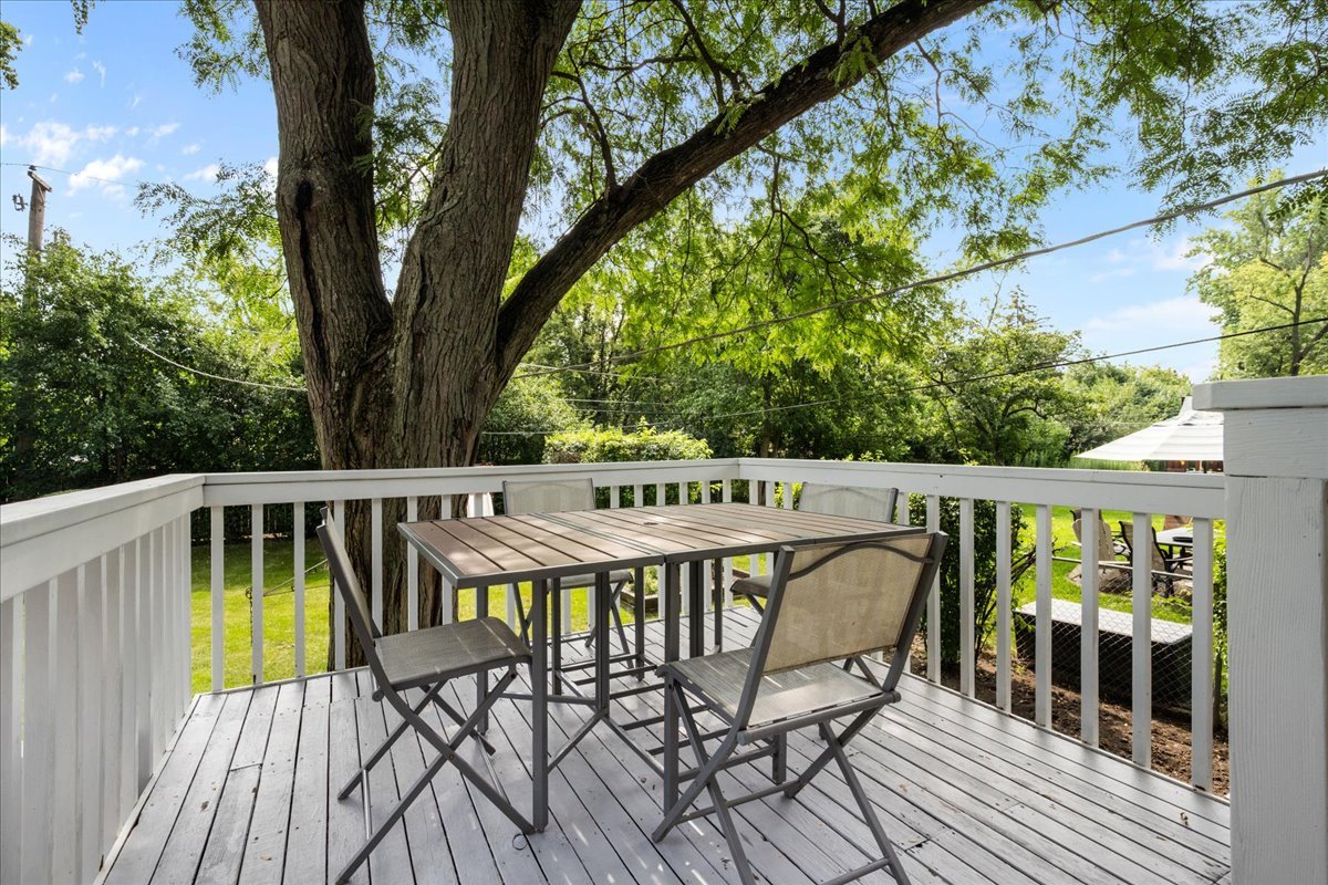 1115 Kenton Road Deerfield, IL 60015 - Photo 27 of 30 a view of a deck with two chairs and a table