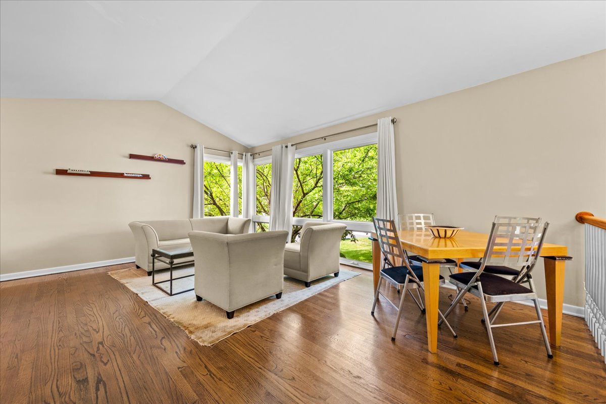 1115 Kenton Road Deerfield, IL 60015 - Photo 4 of 30 a living room with furniture and wooden floor