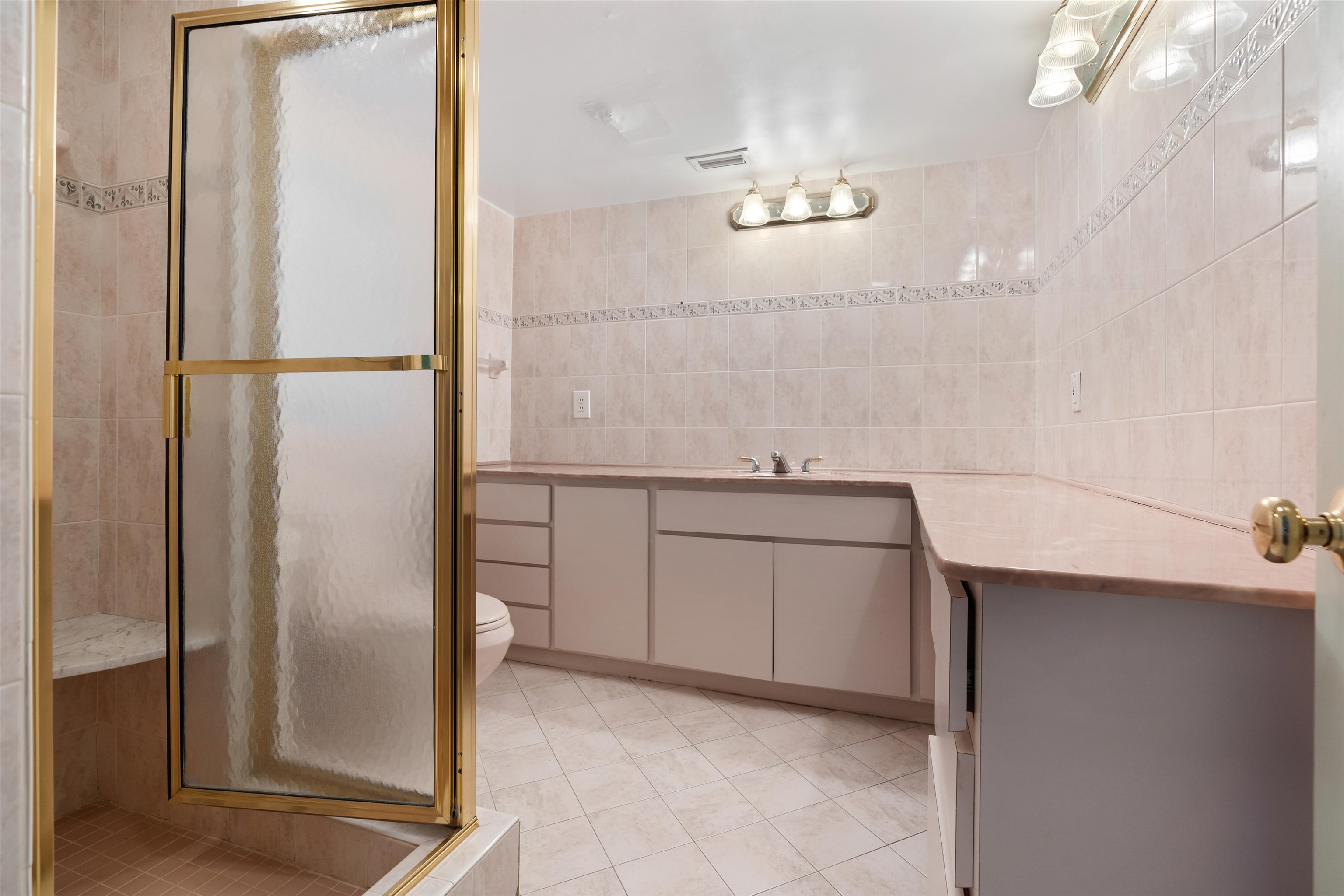 65 Busam Street St. Augustine, FL 32080 - Photo 14 of 59 a bathroom with a shower and a sink