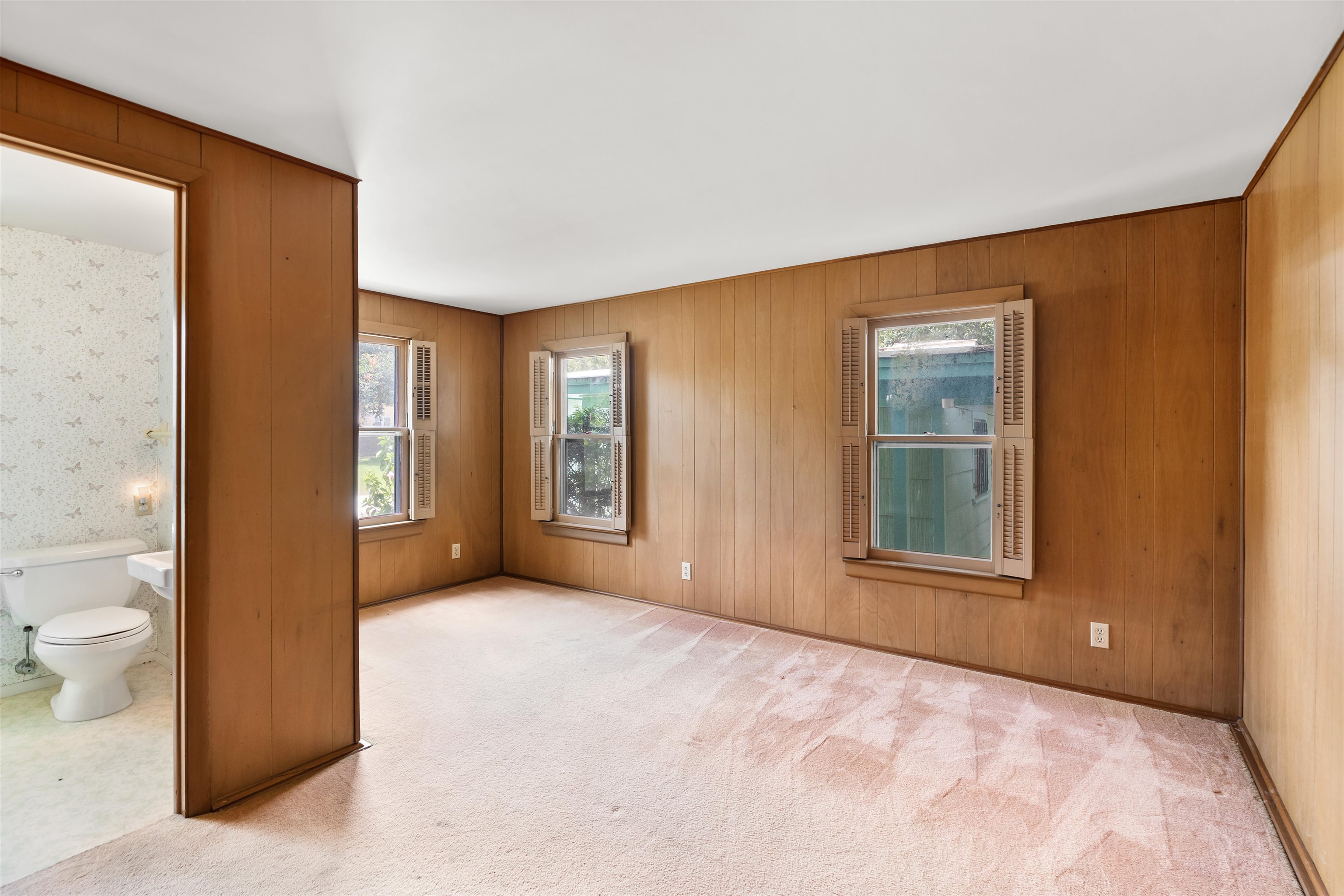 65 Busam Street St. Augustine, FL 32080 - Photo 31 of 59 a view of an empty room with glass door and wooden floor