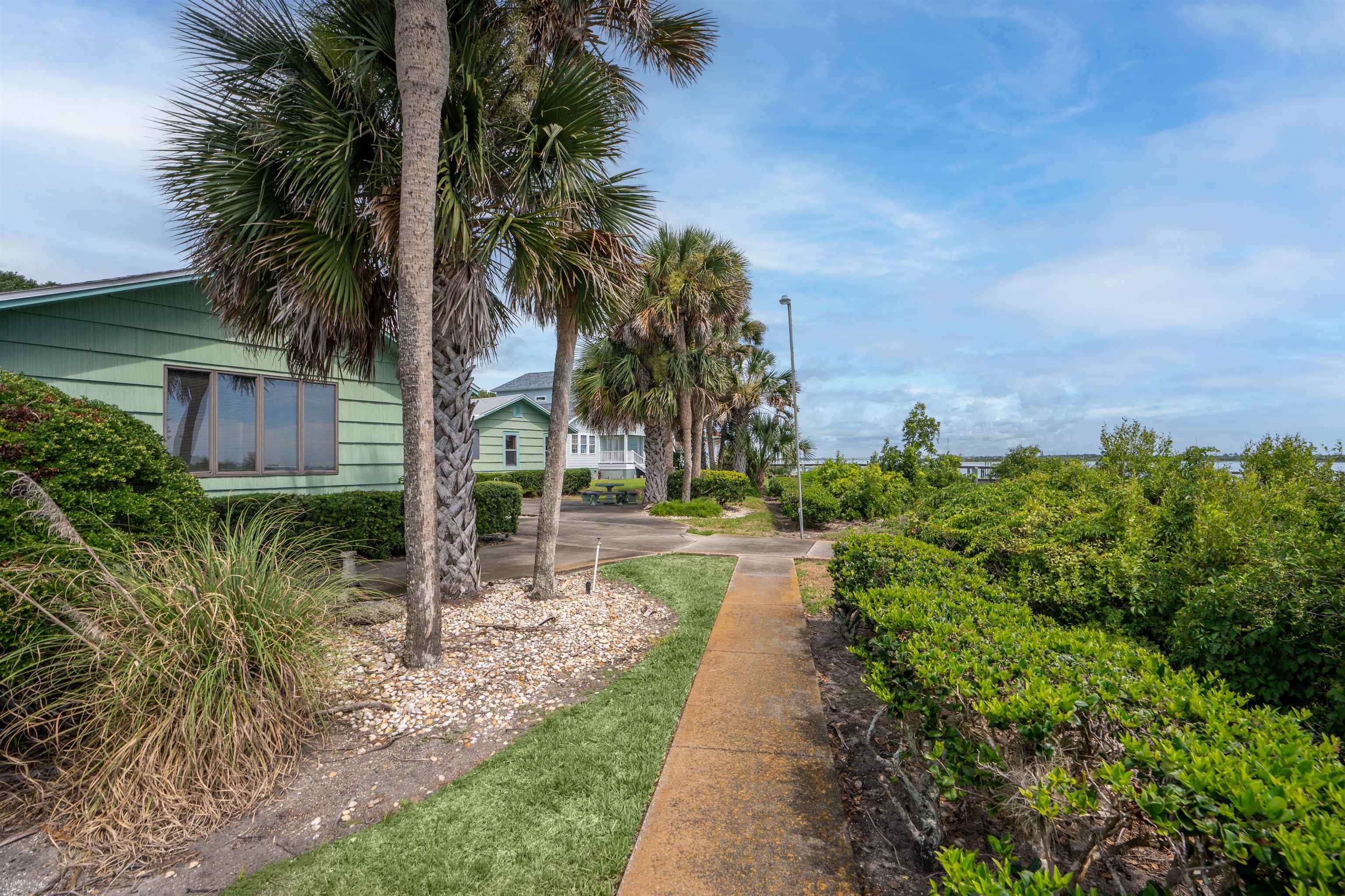 65 Busam Street St. Augustine, FL 32080 - Photo 40 of 59 a view of a garden with a fountain