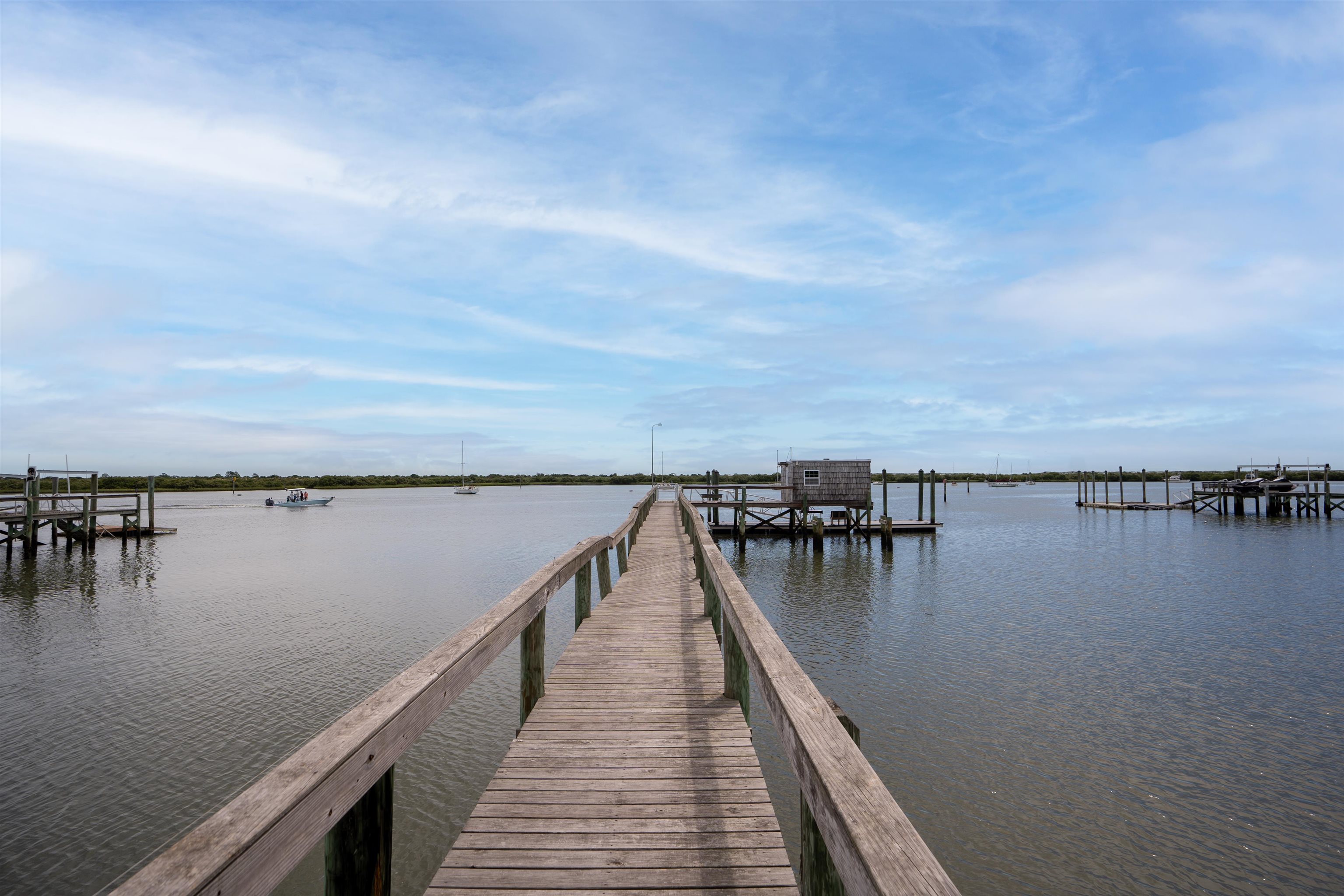 65 Busam Street St. Augustine, FL 32080 - Photo 44 of 59 a view of a table and chairs on the balcony