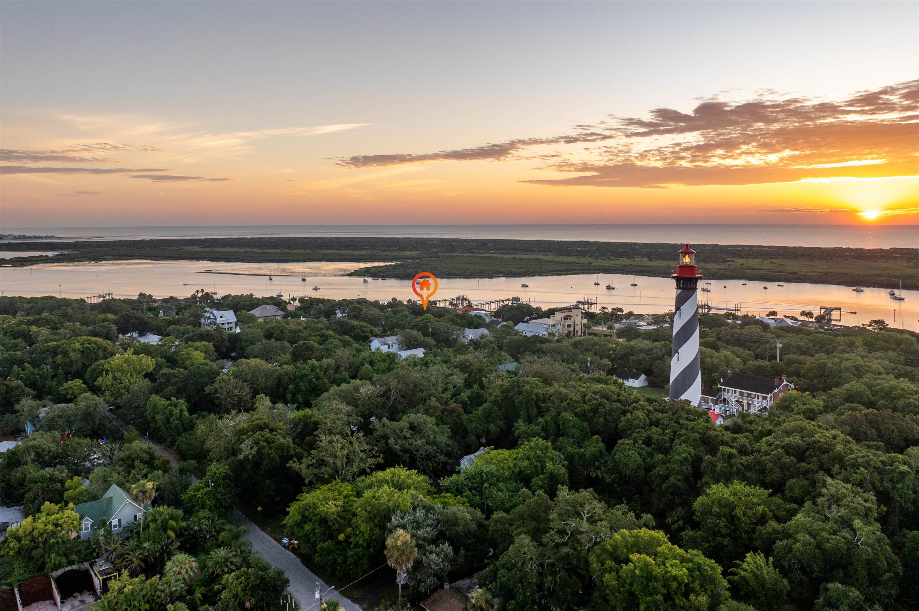 65 Busam Street St. Augustine, FL 32080 - Photo 58 of 59 an aerial view of a city with lots of residential buildings ocean and mountain view in back