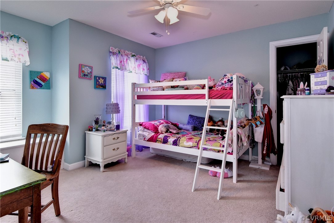 3986 Bournemouth Bend Williamsburg, VA 23188 - Photo 23 of 47 a bedroom with furniture and a bed