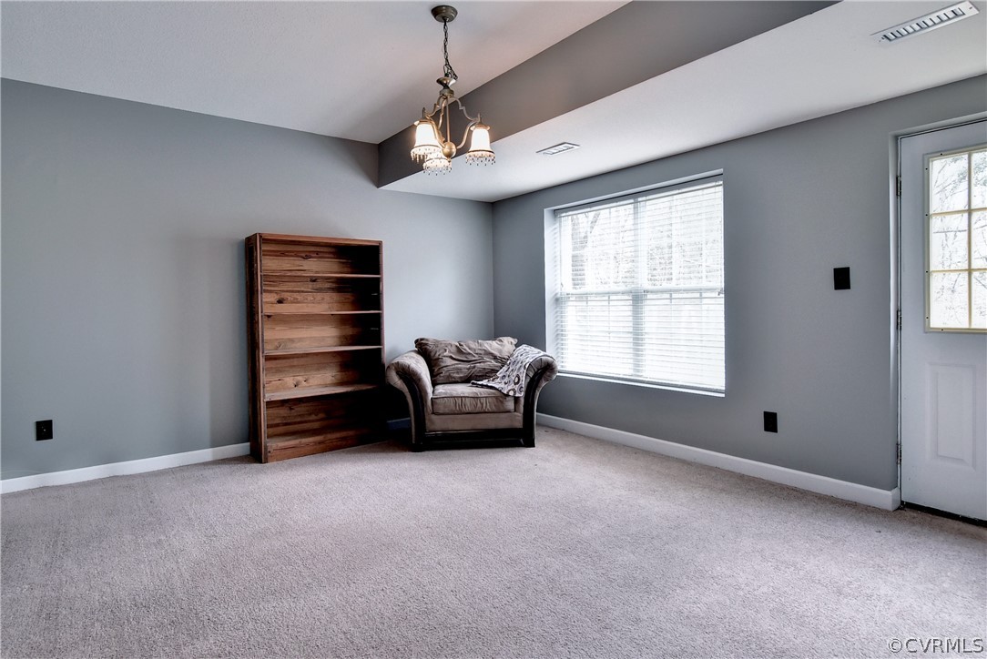 3986 Bournemouth Bend Williamsburg, VA 23188 - Photo 35 of 47 a living room with furniture windows and a ceiling fan