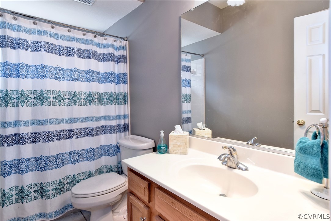 3986 Bournemouth Bend Williamsburg, VA 23188 - Photo 37 of 47 a bathroom with a sink toilet and shower