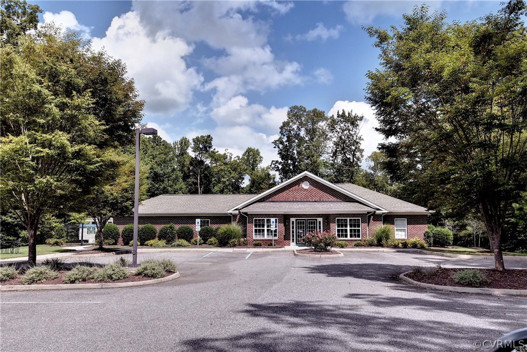 3986 Bournemouth Bend Williamsburg, VA 23188 - Photo 42 of 47 a front view of a house with garden