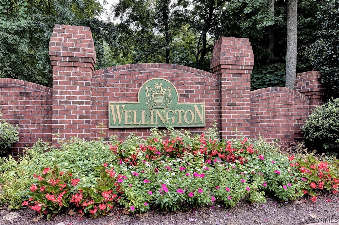 3986 Bournemouth Bend Williamsburg, VA 23188 - Photo 47 of 47 a sign that is sitting in front of flowers