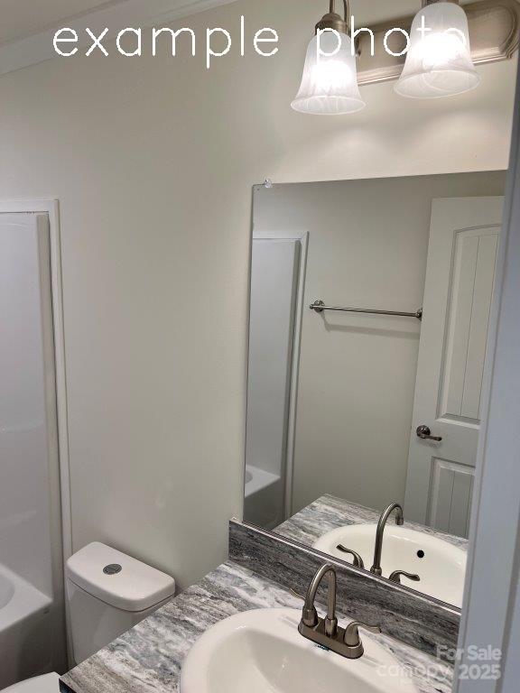 255 Reep Drive, Unit 3 Morganton, NC 28655 - Photo 17 of 29 a bathroom with a sink and a toilet