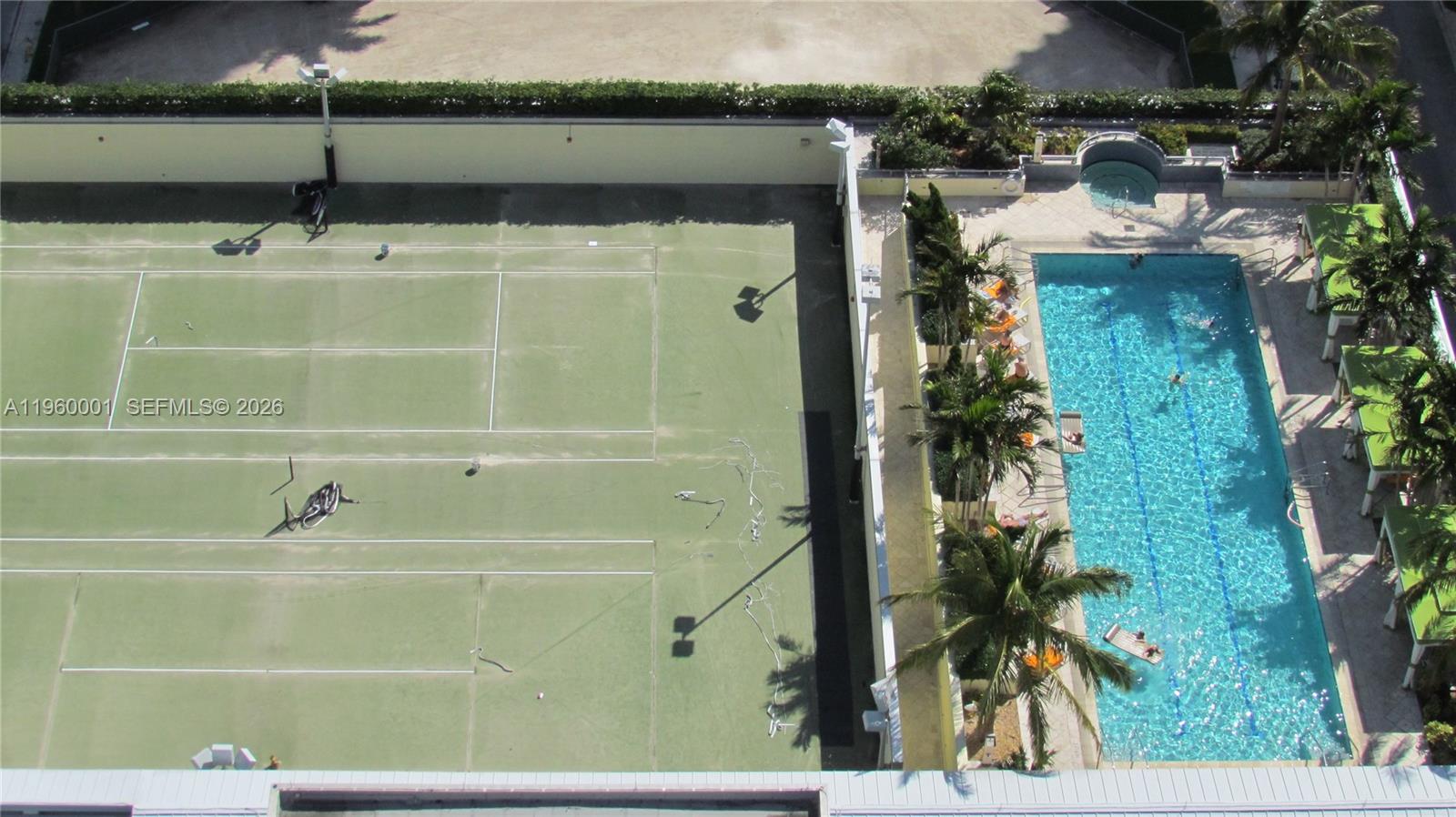 1395 Brickell Avenue, Unit 3210 Miami, FL 33131 - Photo 10 of 10 a bathroom with a shower and a sink