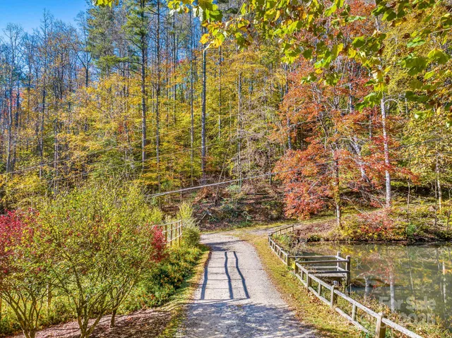a bedroom with a bed and a table in it