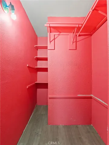 a hotel room with two beds and a couch