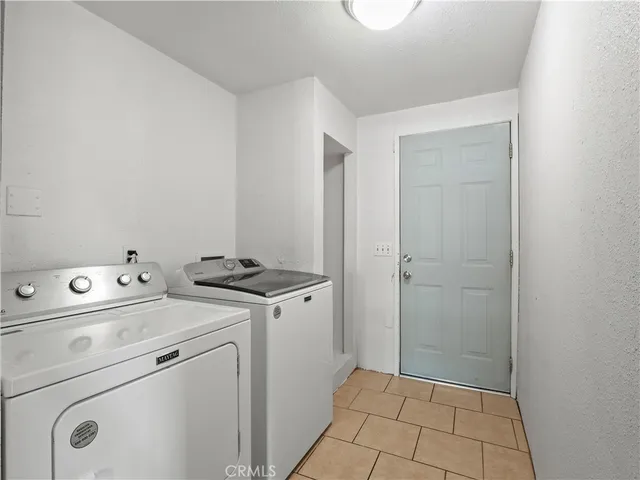 a view of a back yard of the house