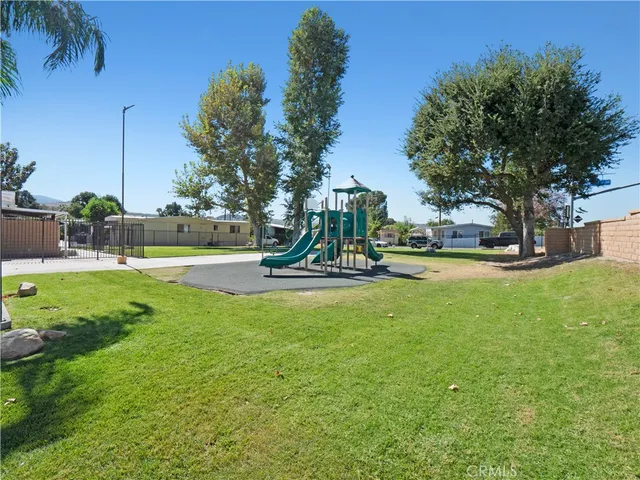 a view of a park with swings