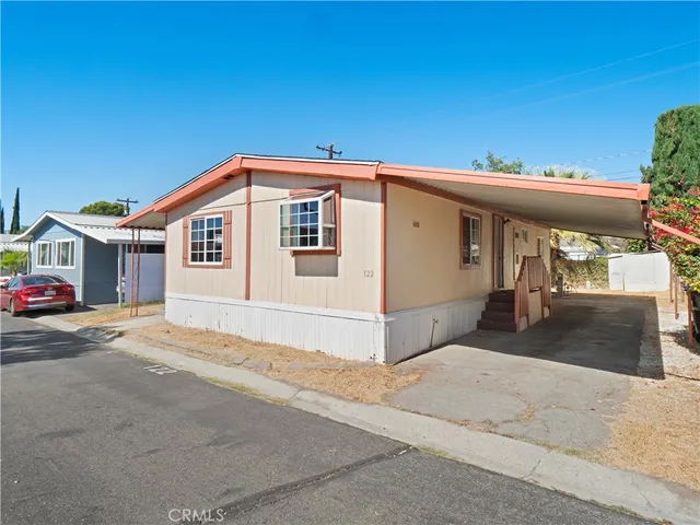 a front view of a house with a garage