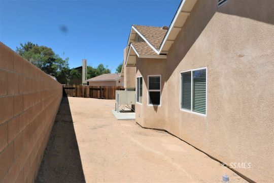 421 Mavis Court Ridgecrest, CA 93555 - Photo 33 of 33 a view of a house with backyard and sitting area