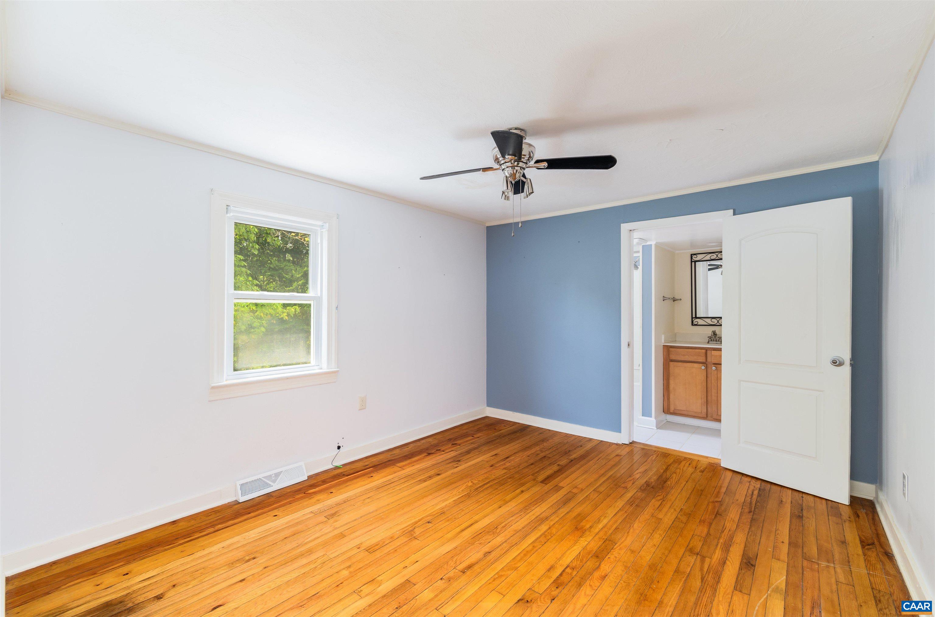 3072 Stony Point Road Charlottesville, VA 22911 - Photo 13 of 41 a view of empty room with wooden floor and fan