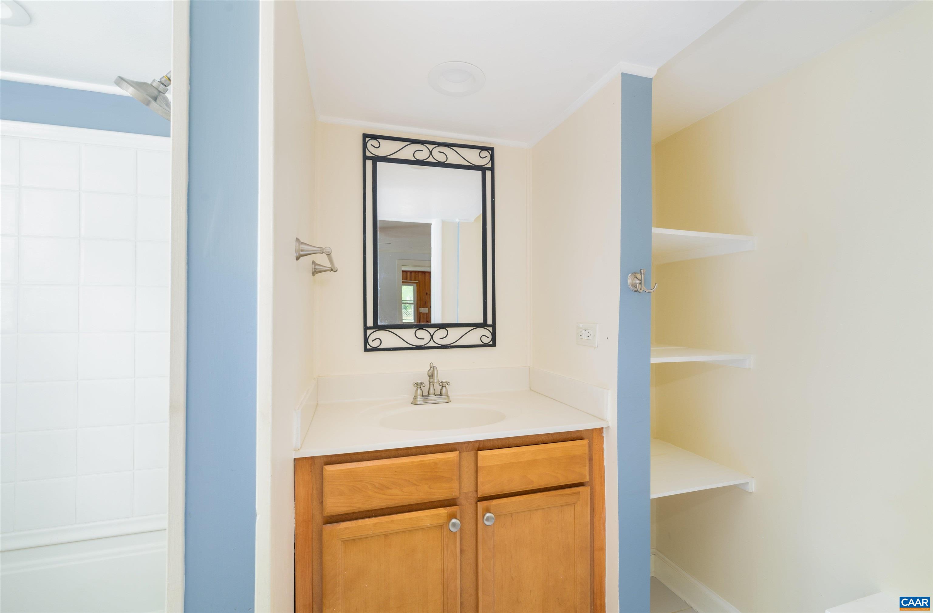 3072 Stony Point Road Charlottesville, VA 22911 - Photo 15 of 41 a bathroom with a sink and a mirror