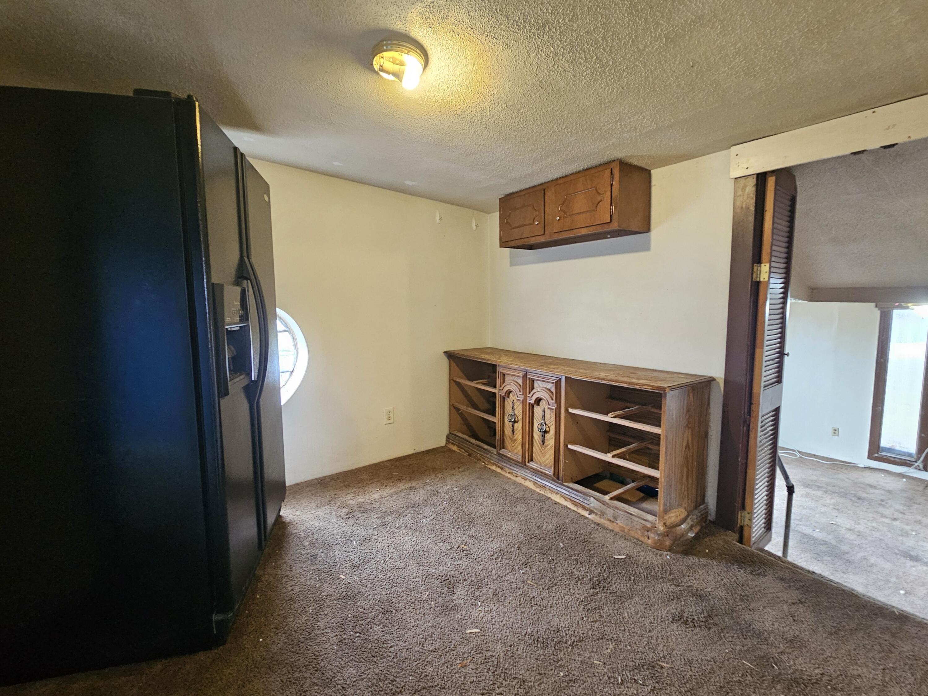 5235 Stair Road Lafayette, IN 47905 - Photo 11 of 15 a view of an empty room with a fireplace