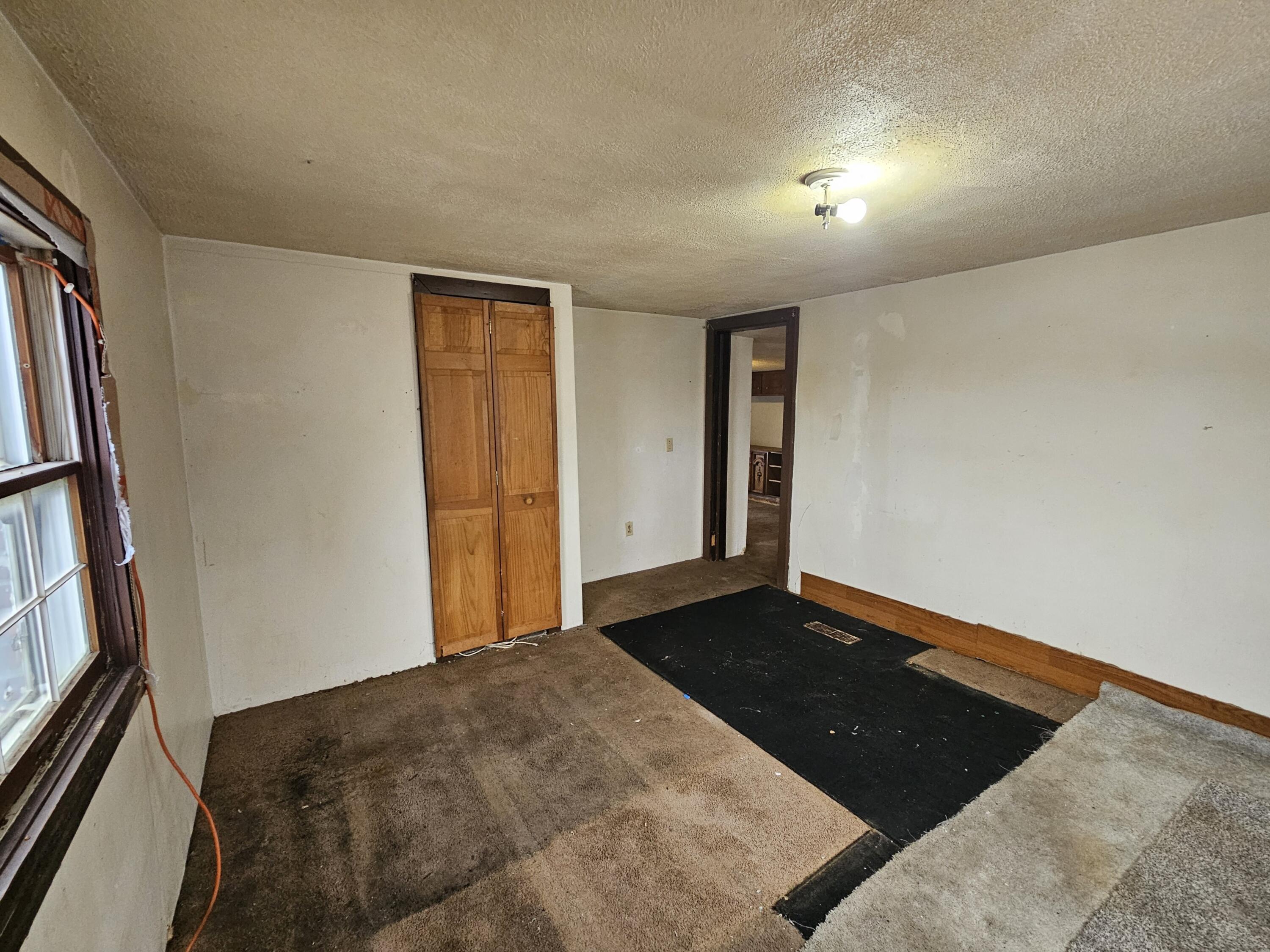 5235 Stair Road Lafayette, IN 47905 - Photo 13 of 15 a bedroom with a bed and a dresser