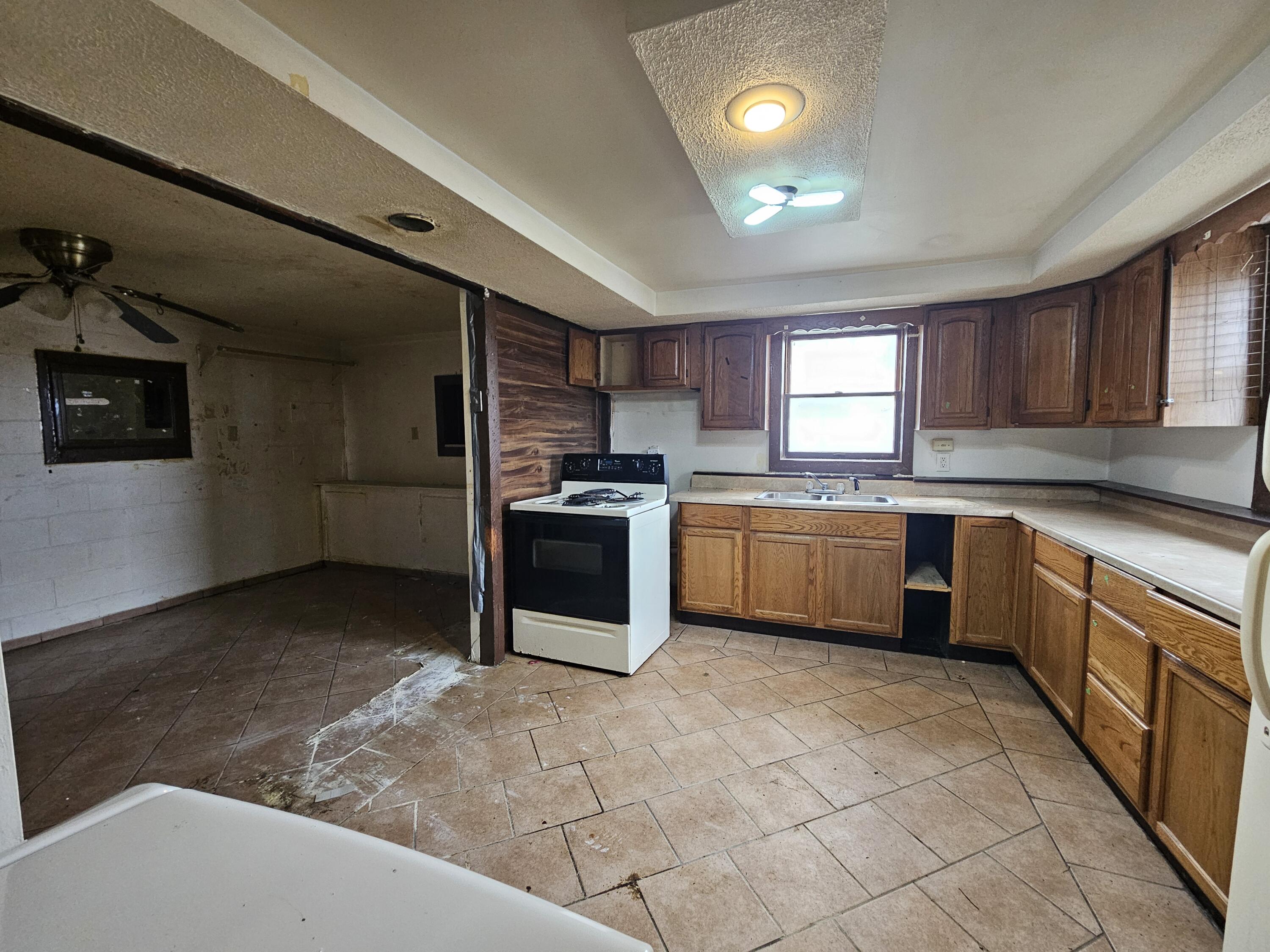 5235 Stair Road Lafayette, IN 47905 - Photo 4 of 15 a kitchen with cabinets a sink and appliances