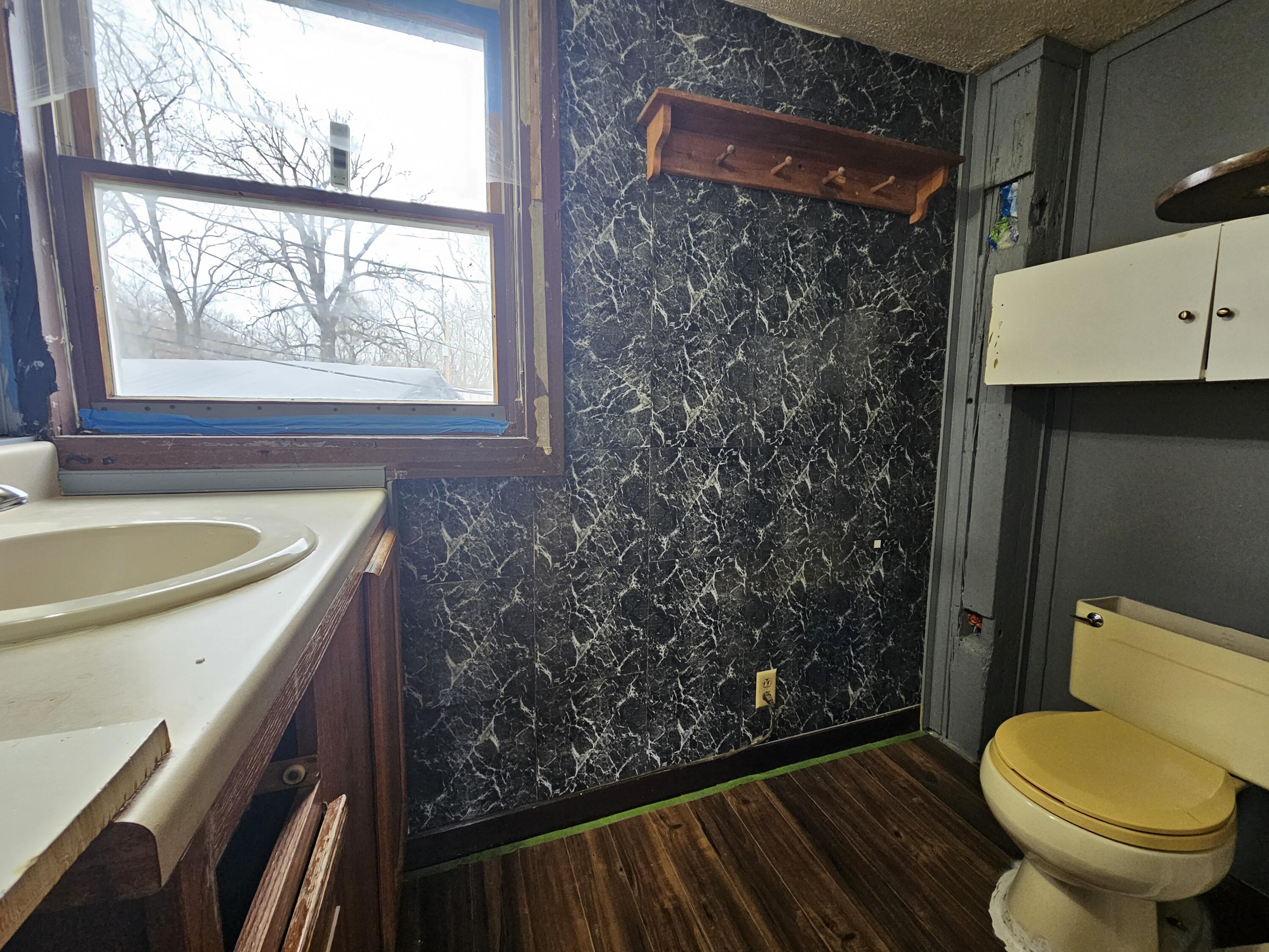 5235 Stair Road Lafayette, IN 47905 - Photo 10 of 15 a bathroom with a sink and a toilet