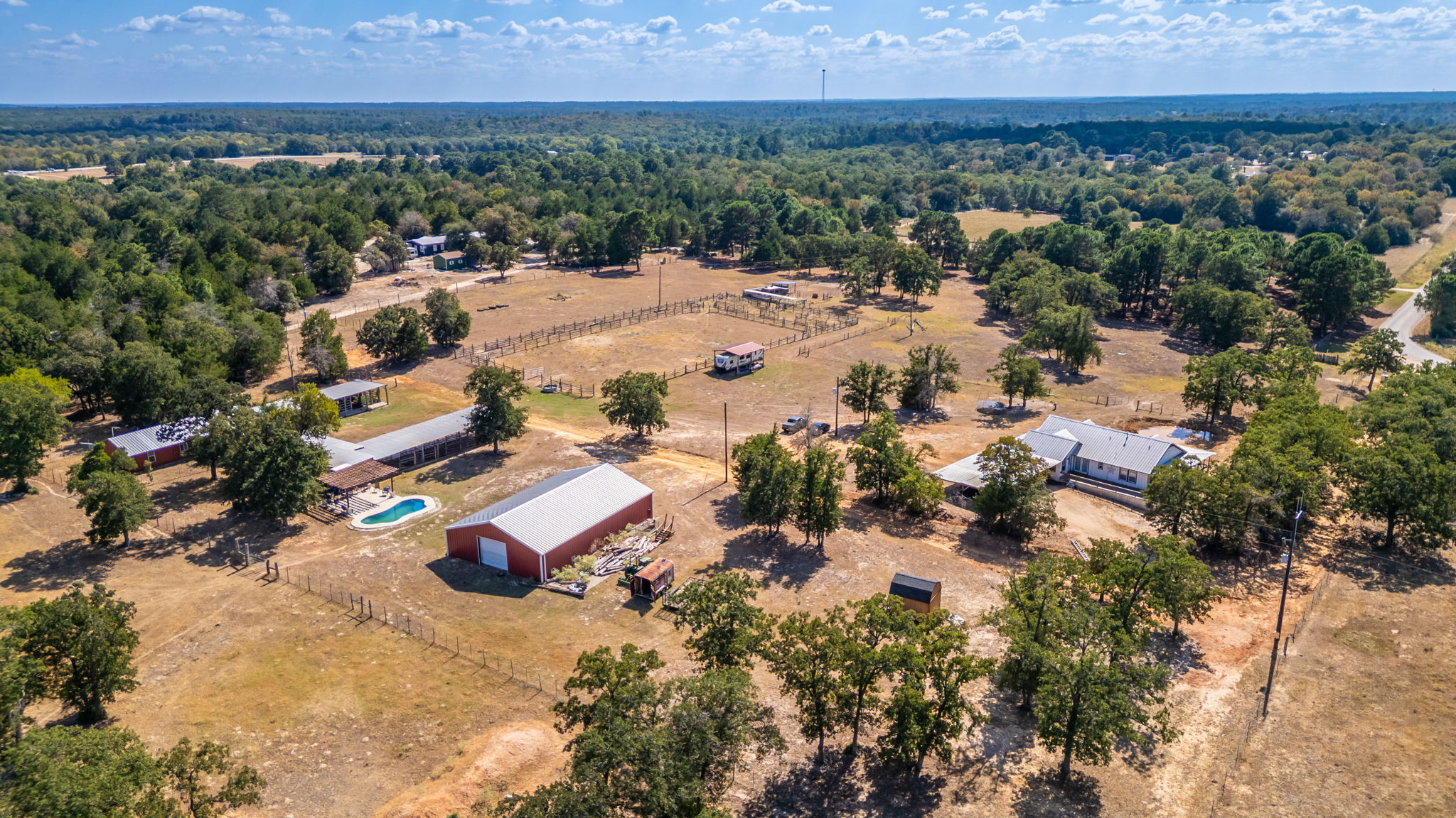 274 Old Potato Road Paige, TX 78659 - Photo 19 of 39 Overview of rural landscape featuring a forest